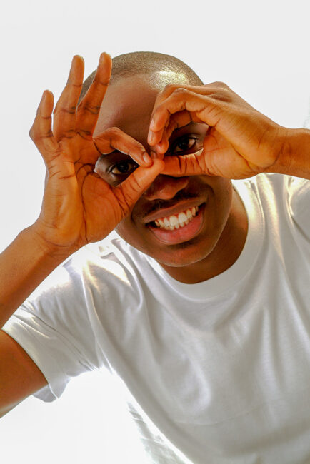 creative-portrait-advertising-photography-man-funny-hand-gesture-lagos-nigeria